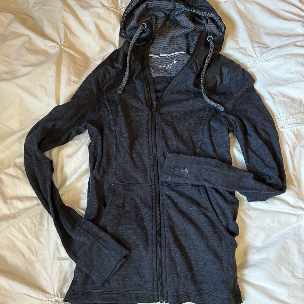 Smartwool hoodie with nylon shoulder protection for light protection for precip
